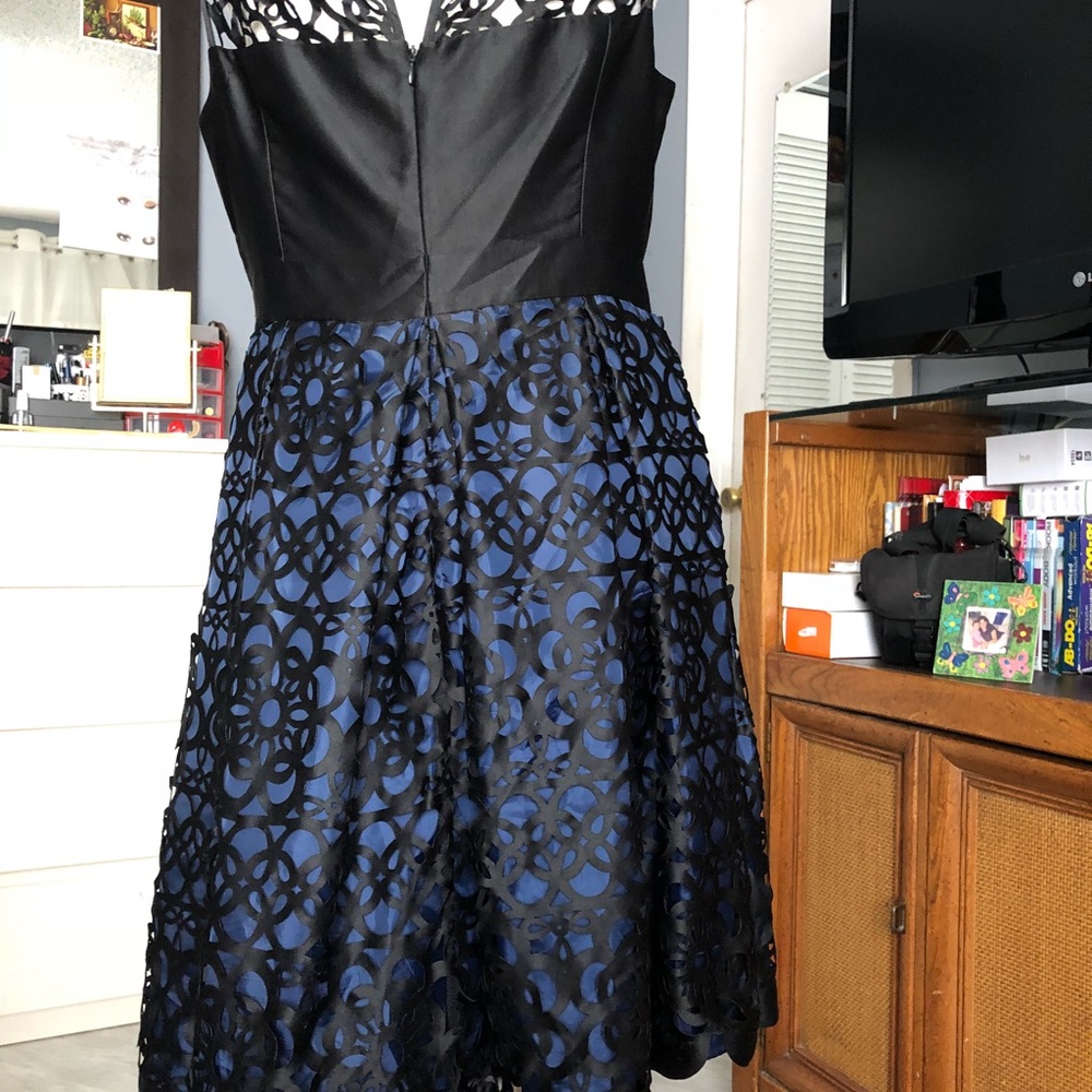 Black dress with laser cut detail - Picture 6 of 8